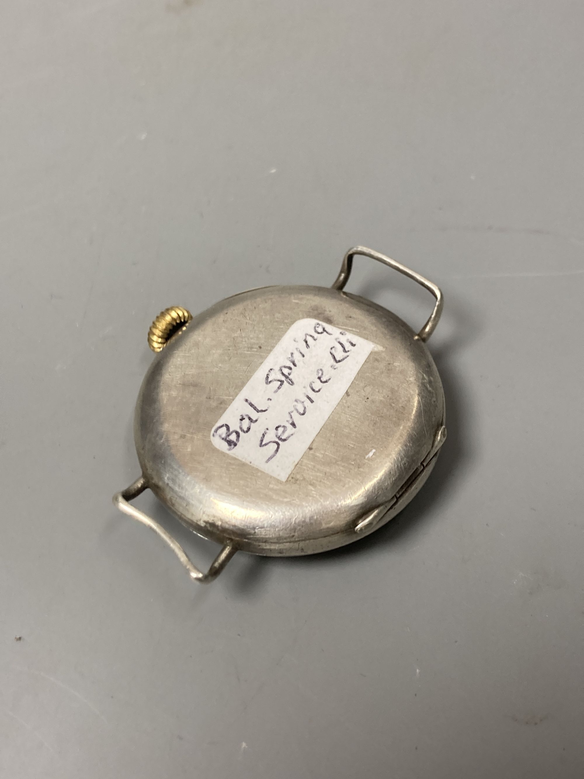 Two gentleman's early 20th century silver cased manual wind wrist watches, including half hunter.